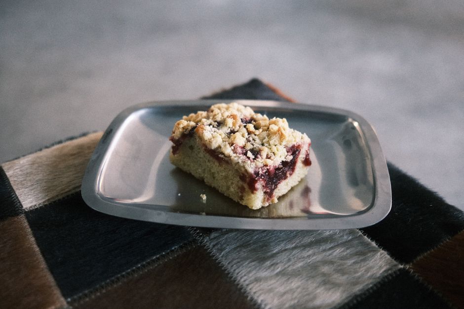 Berry crumble bar on a metal plate