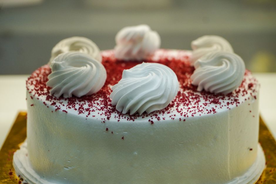 Red velvet cake with cream swirls