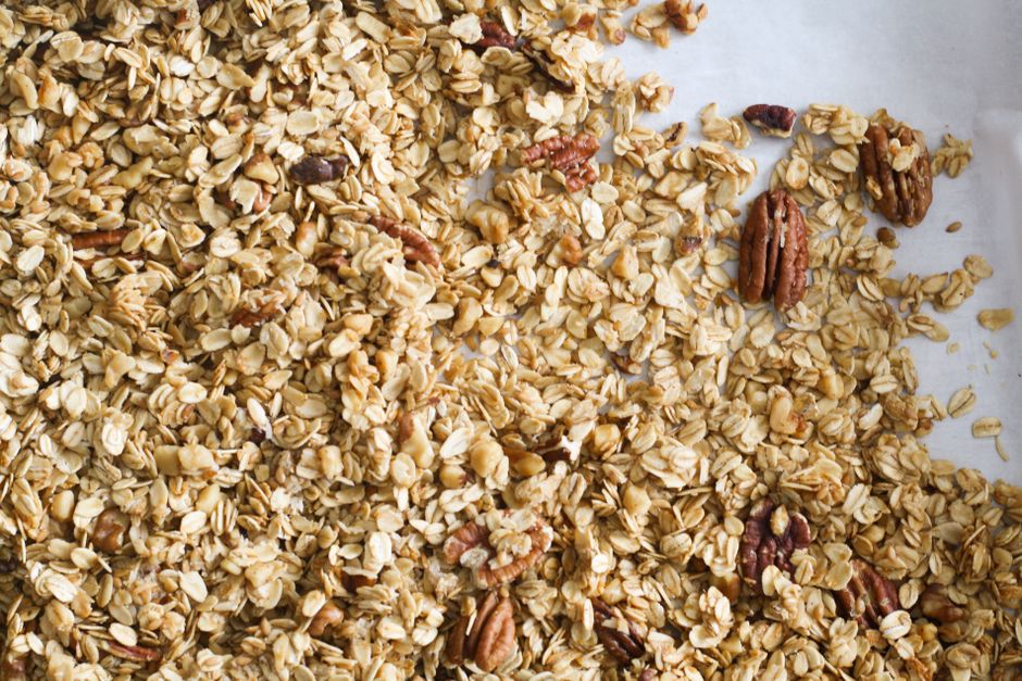 Rolled oats with pecans in a rustic bowl