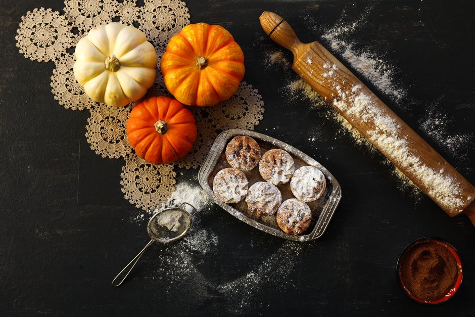 Small pumpkins, rolling pin and fresh bakes ready for autumn baking